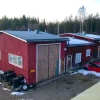 Tradera Bostäder & Lokaler<Verkstadsfastighet fd stor bilverkstad mellan Ljusdal och Ånge. Inhägnad sjötomt