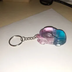 Tradera Nyckelringar<Ww bubblan som nyckelring tvåfärgad 5cm lång.