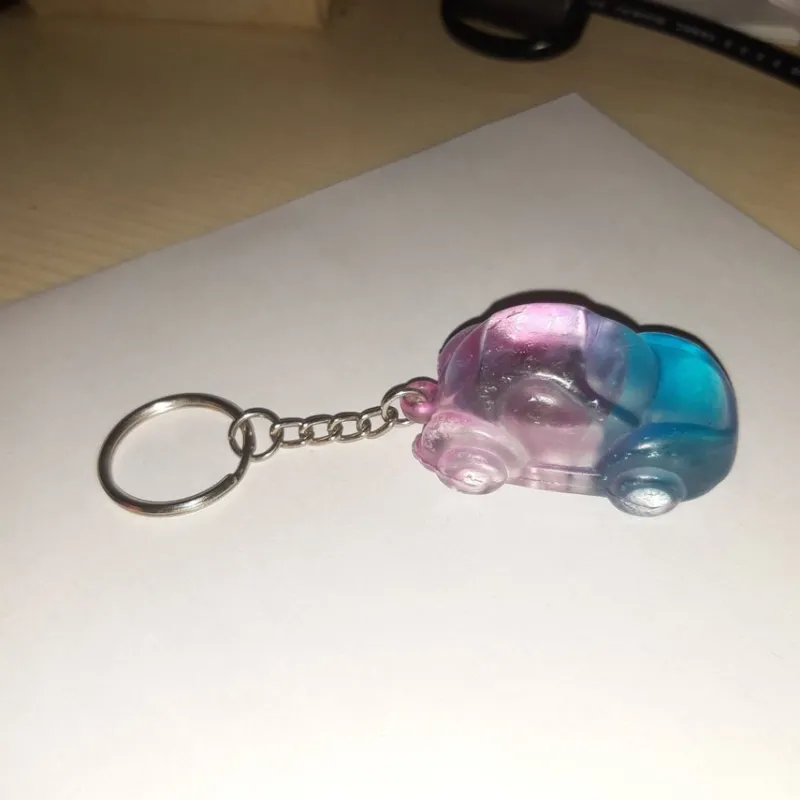 Tradera Nyckelringar<Ww bubblan som nyckelring tvåfärgad 5cm lång.